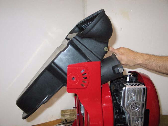 Black plastic nozzle Nozzle Engine Safety gate within vacuum tube 1/4 Screws Figure 4.7 4.8.