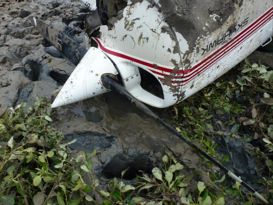 1.5 Wreckage and Impact Information The aircraft found on the coastline at approximately 12 Nm from Cirebon on heading of 320 and on upside down condition.