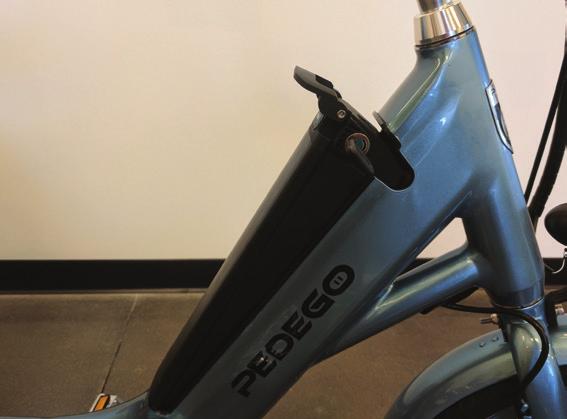 Parking Brake location Parking brake activated Bucket Your Pedego Trike is equipped with a rear bucket: Locked Position Open Position The battery must be locked into place when fully inserted in the