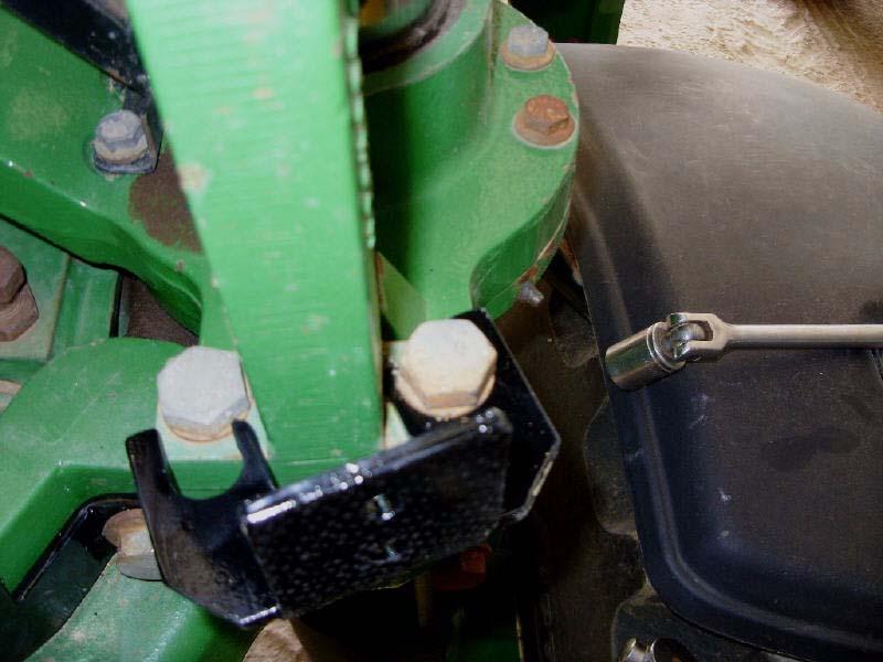 Mounting Wheel Angle Sensor Hardware 3. Attach the wheel angle sensor bracket as shown using existing suspension support bolts. See Figure 3-3.