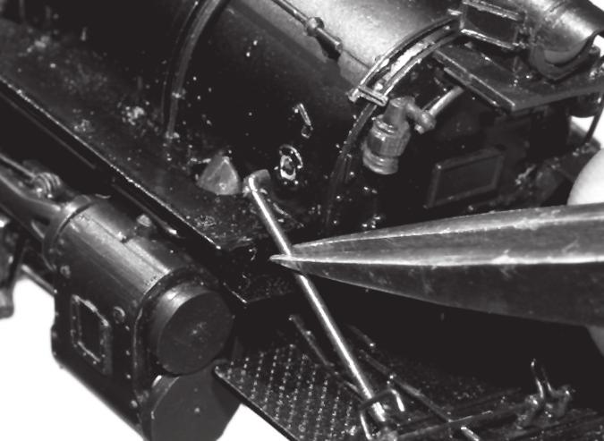 4. Remove the boiler supports from each side of the smokebox as shown in Figure 11. 5.
