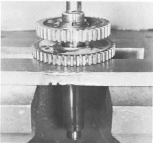 The left-side countershaft takes a 47 tooth PTO gear; the right -side