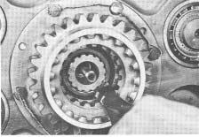 auxiliary drive gear nut and drive gear. 4.