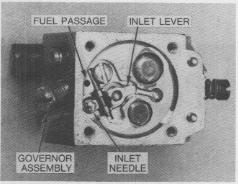 For repairs and adjustments refer to Servicing Information on the WT-l Walbro Carburetor. 36.