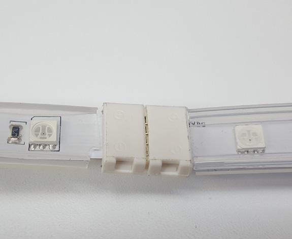 diagram 3 Carefully open both white portions of the Strip to Strip connector, revealing the connection contacts.