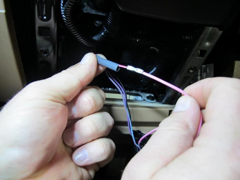 Step 25: Then, strip the other factory wire and the ignition pigtail ¼ inch.