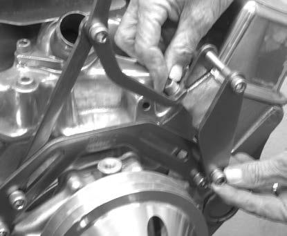 5 ATTACH the Alternator Bracket to the Adjusting Plate and add washes as needed to achieve the 5 8" total thickness