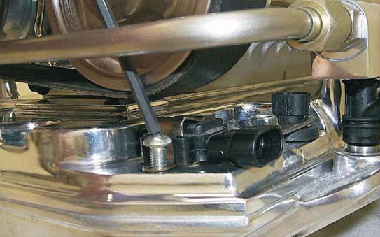 56. Using a 4mm Allen wrench, install the MAP sensor retaining clip with the