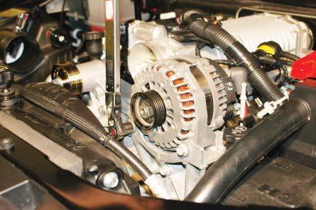 80. Install alternator on the stock bracket and torque the fasteners to 40 ft-lb using the