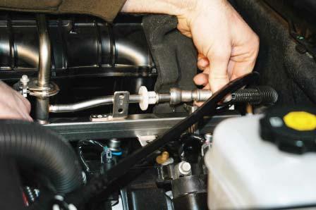 20. With the fuel rail disconnect tool supplied, remove the fuel lines form the fuel rail.