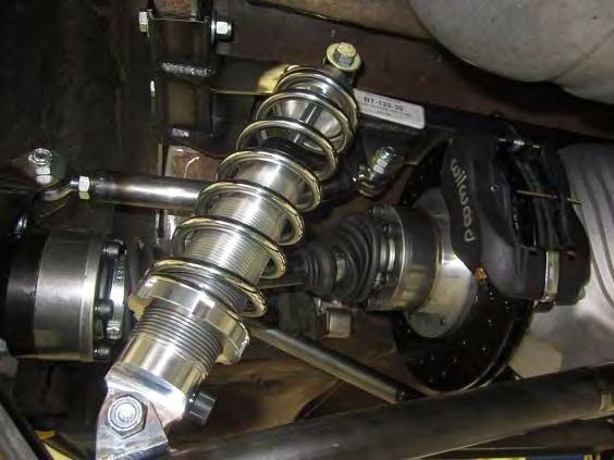 Use the ½-13 x 2 ½ bolt and nylock nut for the lower mount on the lower control arm.