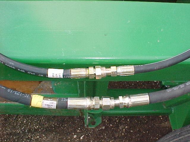 Refer to Figure(s) 2.3& 2.4 2.3 Attach yellow hose (LAN169865) to reel drive hose that is unhooked.