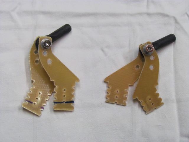 Rudder uses two pairs of control horns for pull-pull cables.