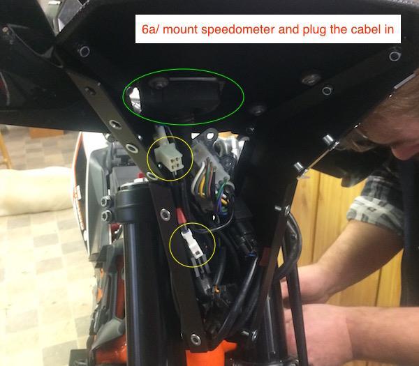 7/ Connect all electrical connectors together again and make sure the sockets for Lights and Turn signals are visible. Note! There still must be space for the LED Balast box Before you proceed!