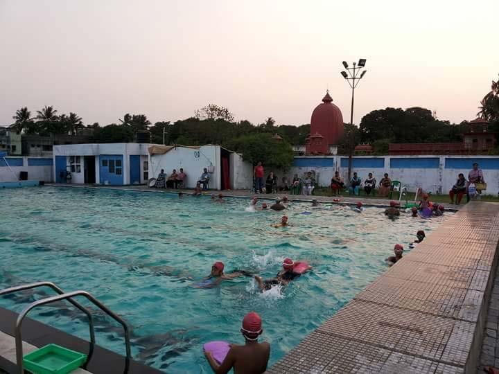 is not any swimming pool nearby. People from different age groups (mostly kids) are coming for swimming session.