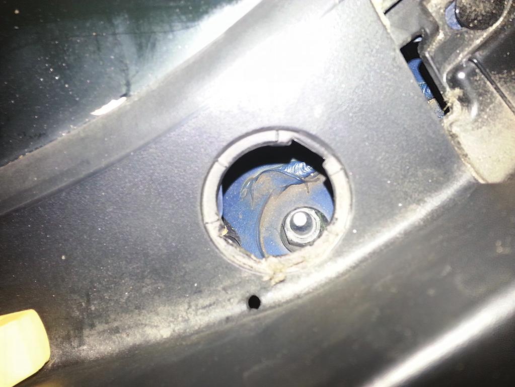 This provides access to the upper strut mount nuts. fig.