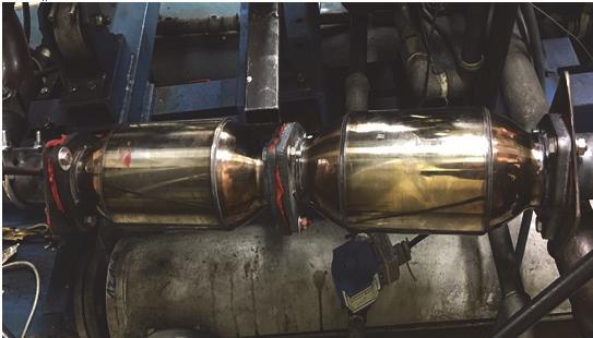 These elements are placed exactly in the exhaust gas flow axis and additionally sealed with a high temperature paste and then screwed together.