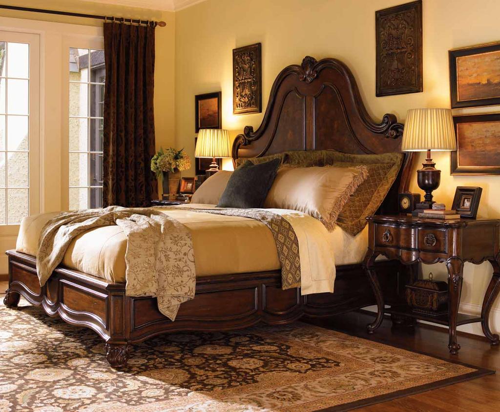 B E D R O O M 3 The Grande Salon Bed features a dramatic arched headboard, with detailed carvings on the cap rail, and a field of elegant Olive Ash Burl on the panels.