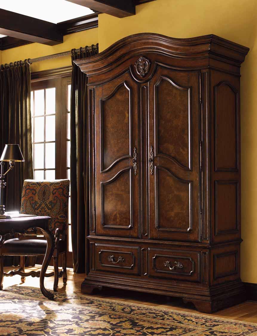 Inset panels on the doors of the Beverly Glen Armoire feature an