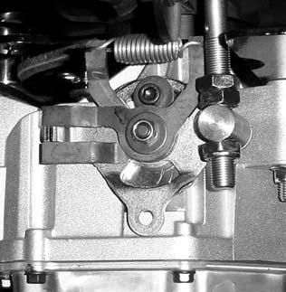 To adjust the neutral setting for no wheel rotation Model IZT 95044, 046, 048, 050:. Use a hex wrench to loosen the locking bolt (Figure ).