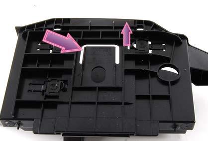 Step 2 pry up Remove the tray from the cassette by prying up on the retaining tab on the