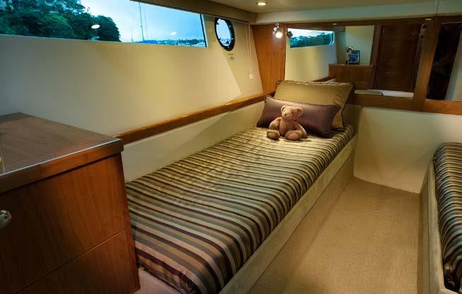 Below decks you will find a companionway with a full-height pantry or linen cupboard and room for optional appliances.