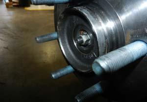 Install outer tie rod ends to knuckle using factory hardware.