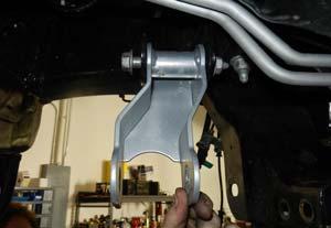 (Fig 25) Install rear differential mount using 9/16 x 4 bolt, flat washers, and lock nut.