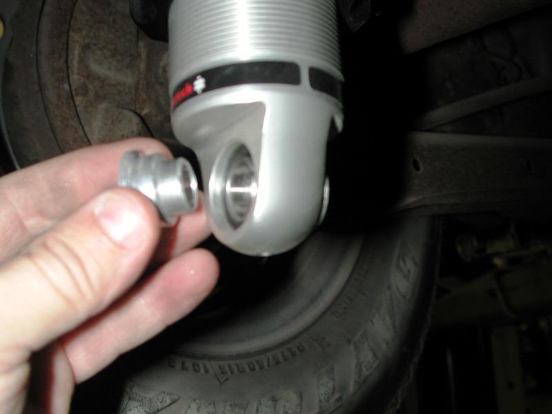 8. Install the Lower Bolt on Shock Bracket in the top 2 holes using (2) ½ x 1 ½ Hex