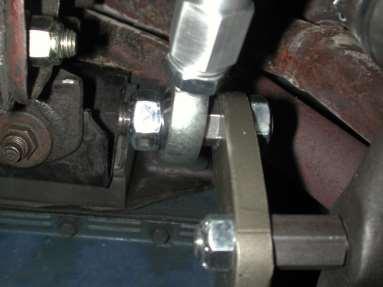 Install the stud with the round flange into the steering arm with the taper going into the steering arm.