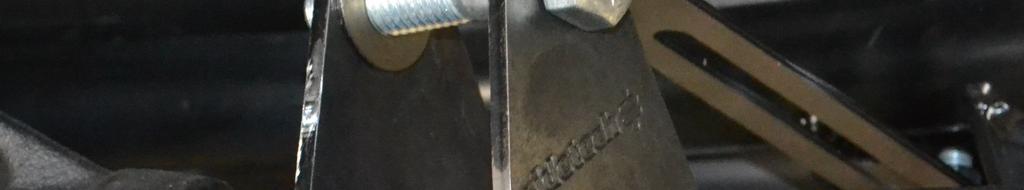 Using another 5/8 x 2 ¾ bolt, fasten the axle tabs to the other end.