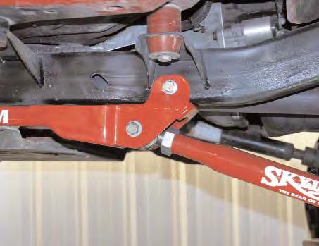 Install the new transfer case shifter bracket (part # JSRB231A) using the instructions provided. 11.