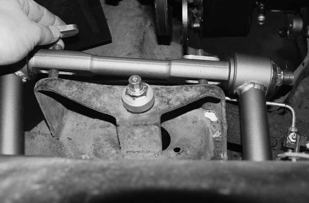 Installing Upper Control rm and Spindle 8. 8. Bolt the upper Control arm to the car using the previous pages to assist you with Cross Shaft orientation and Caster Slug Location.