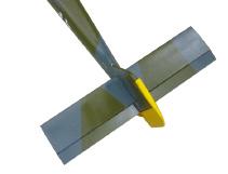 3) While holding the vertical stabilizer firmly in place, use a pen and draw a line on eachside of the vertical stabilizer where it meets the top of