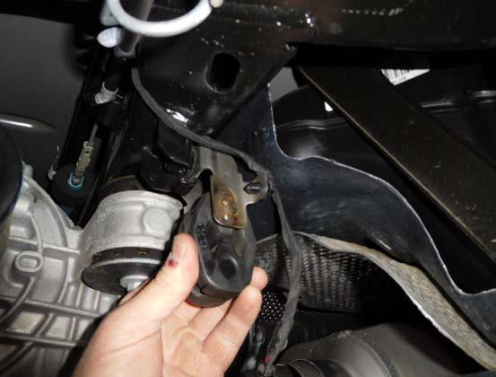 4) Locate the two factory exhaust mounts just forward of the rear differential.