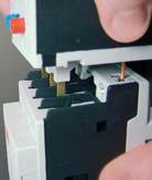 35MM IN RAIL MOUNTING AND FIXING Contactor mounting on and removal from a 35mm DIN rail are tool-less operations and are done by simply applying pressure on the