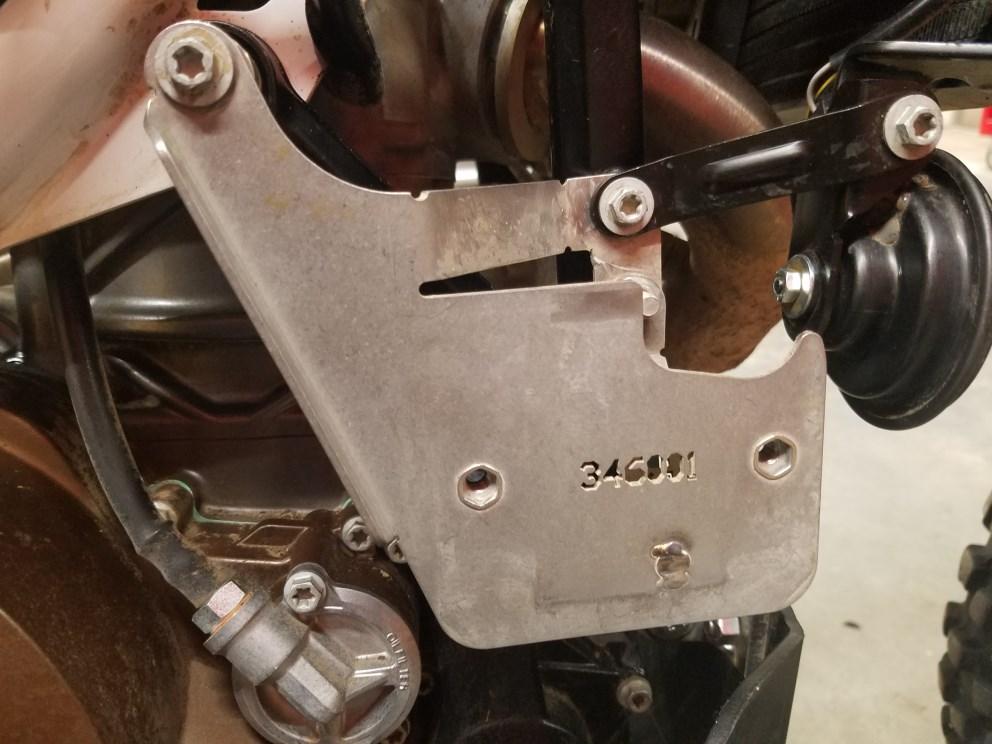 Horn bracket 13. Install Rally Raid Products rectifier bracket #28 re-using the two OEM bolts.