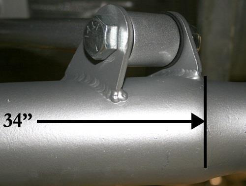 Install the axle housing tabs on the non-adjustable side of the bar with the taller tab on the inside and forward.