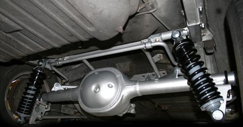 Vehicle height can be adjusted by loosening the set screw in the lower shock ring and turning the ring with a spanner wrench.
