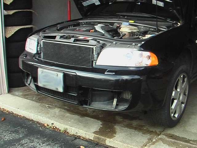 Remove side grilles from bumper.