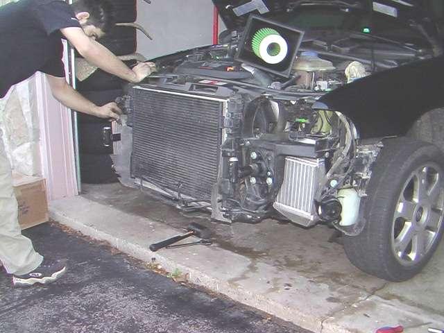 Install power steering cooler together with