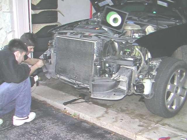 Install intercooler shrouds with single mounting screw.