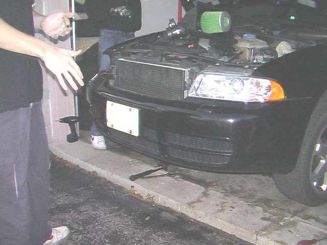 Install bumper grilles, headlights, and
