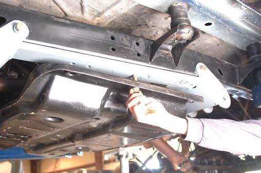34. On Rubicon Models, the compressor bracket will be installed on the rear lower control arm bolt as shown in Photo 16.