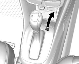 3. Remove the cover on the console. 4. Insert and press the ignition key into the slot. 5. Move the shift lever out of P (Park).
