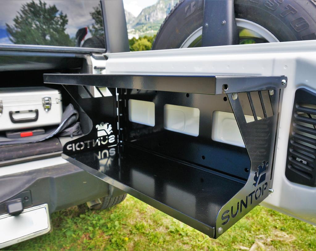 The revolutionary tailgate table.thin when closed (1.3 ).