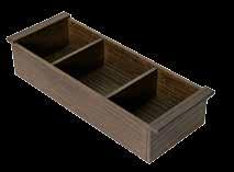 Large interior container for lower drawer only.