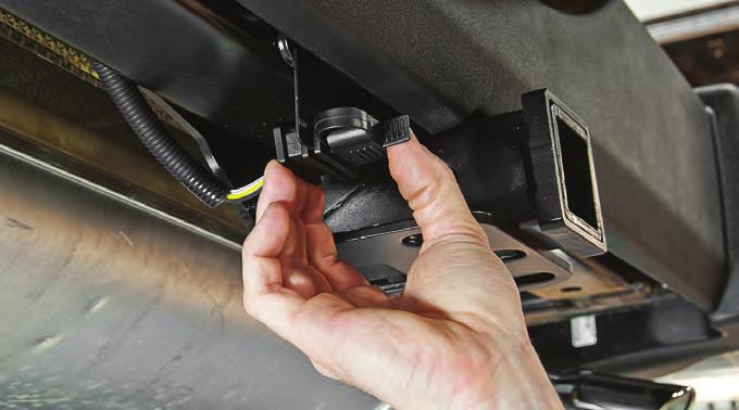 Make sure that the tow harness is at least several inches away from any exhaust components.