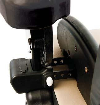 White button Icon To attach the left hip guide: Remove the left armrest.