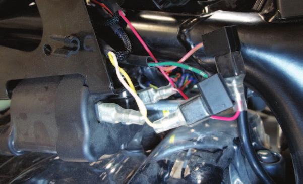 GRN/PUR BRN/PNK 9 Locate and unplug the stock BROWN/PINK wire and the stock GREEN/ PURPLE wire from Ignition Coil #2 (Fig. E). FIG.